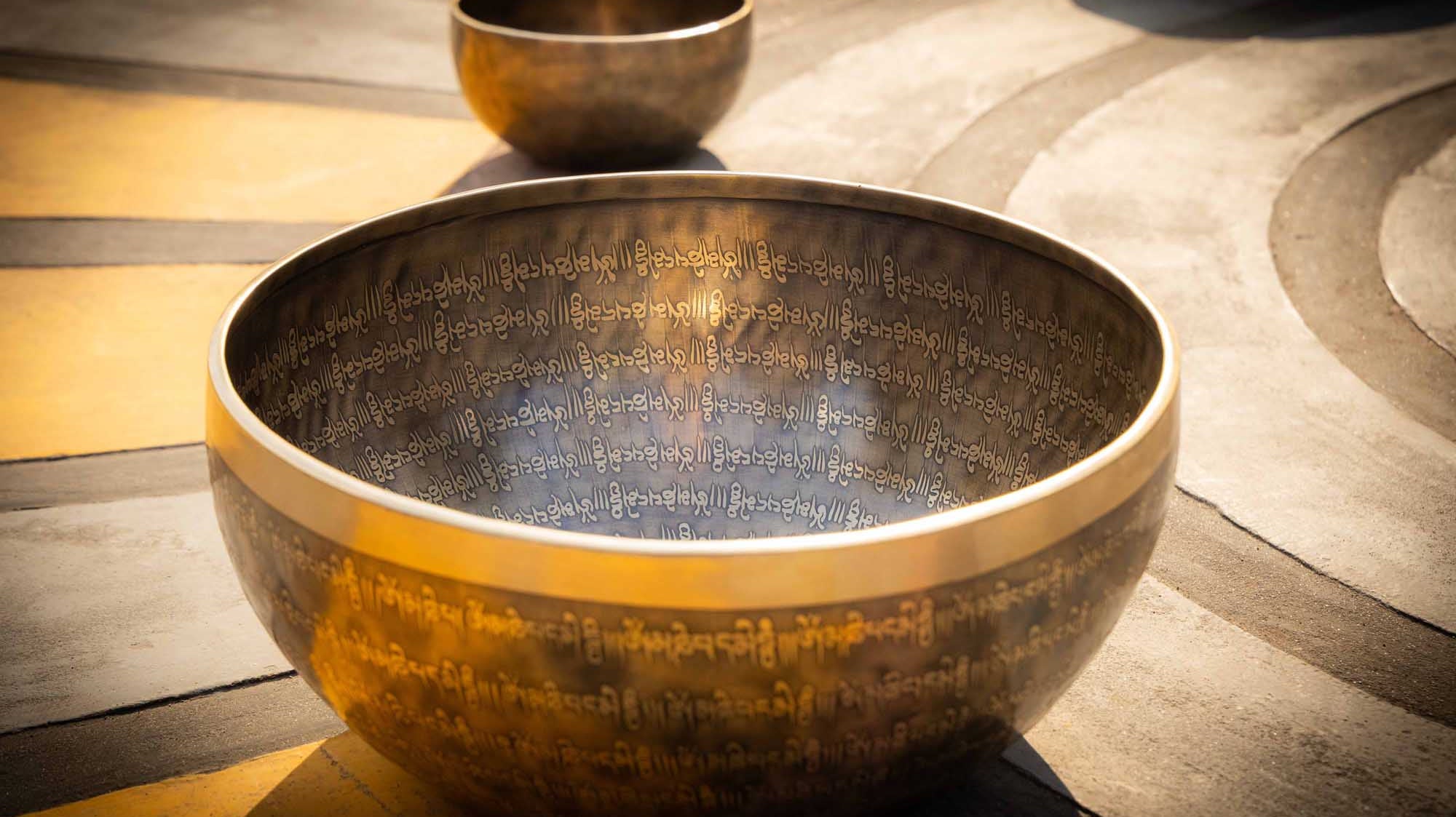 Hand-forged bronze singing bowl, illustrating for resonance, visual tone and melody.