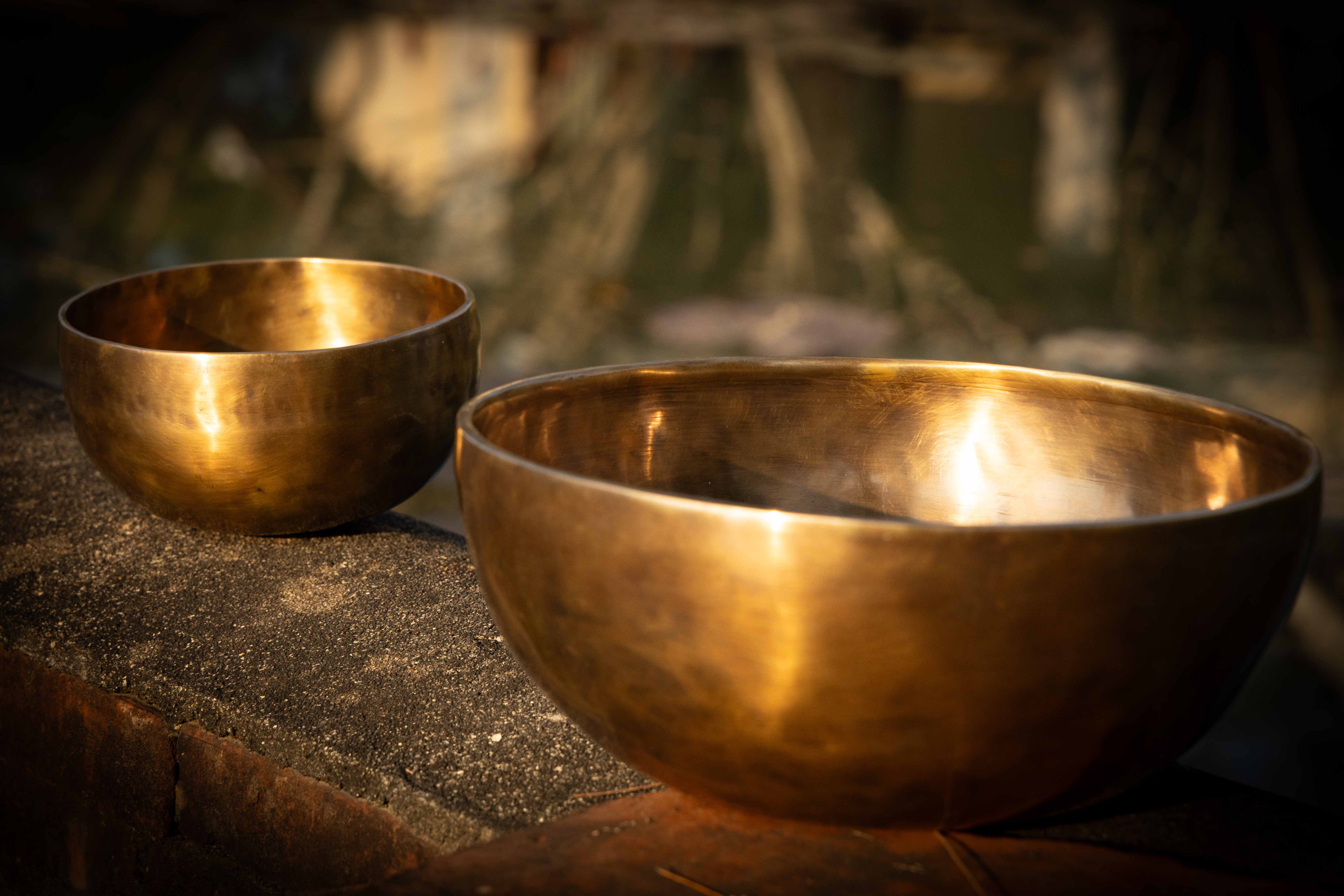 hand-forged tibetan singing bowls bronze natural environment outdoor